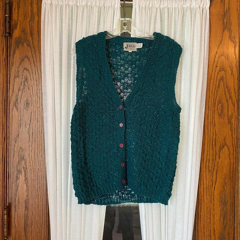 Teal blue / green knitted sweater vest with red buttons